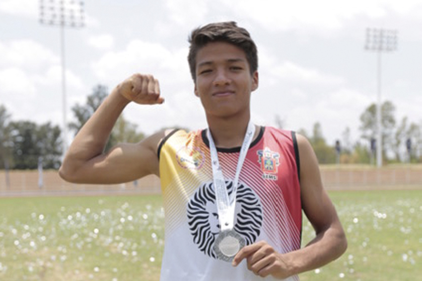 Atleta con medalla