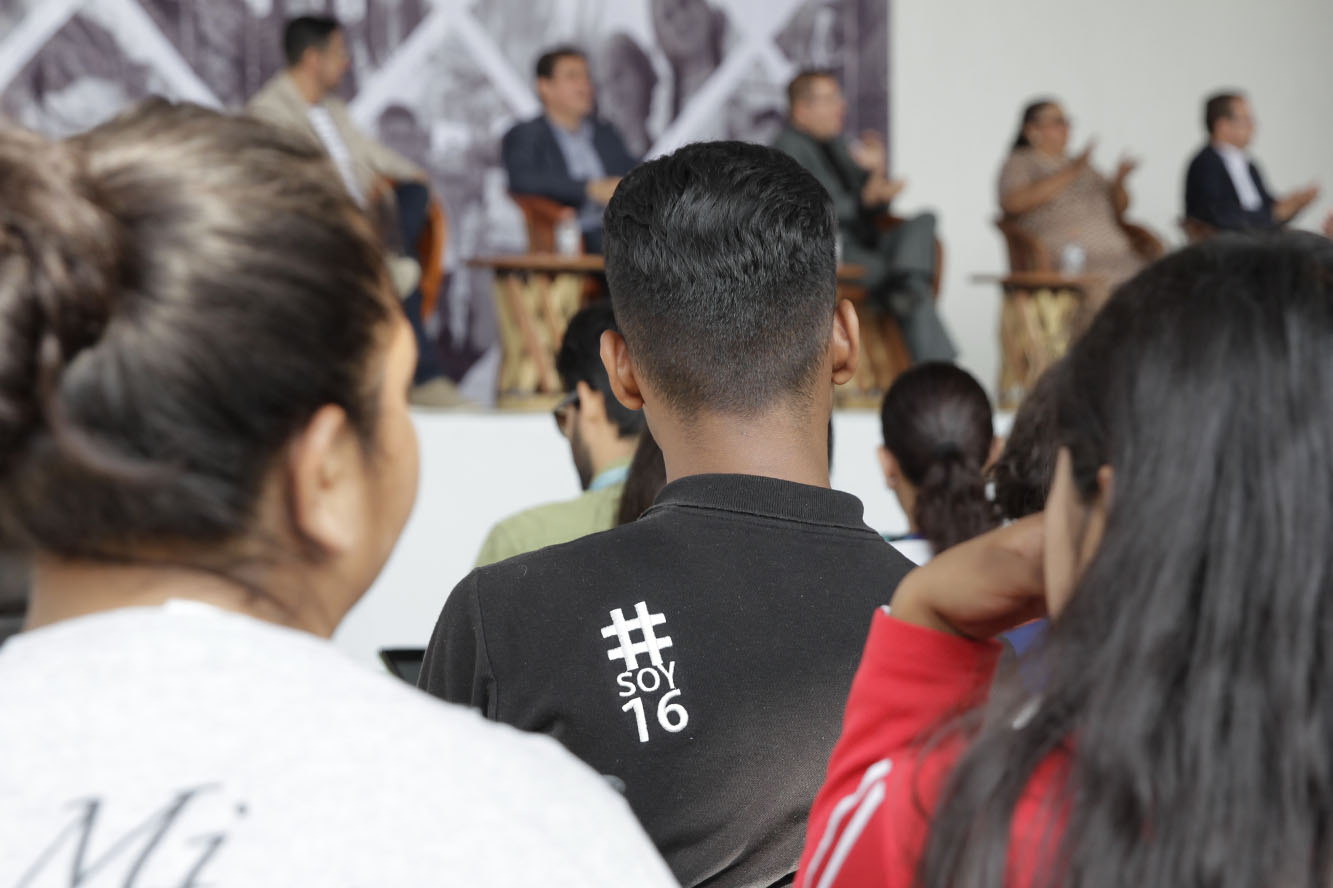 Asistentes al evento en auditorio