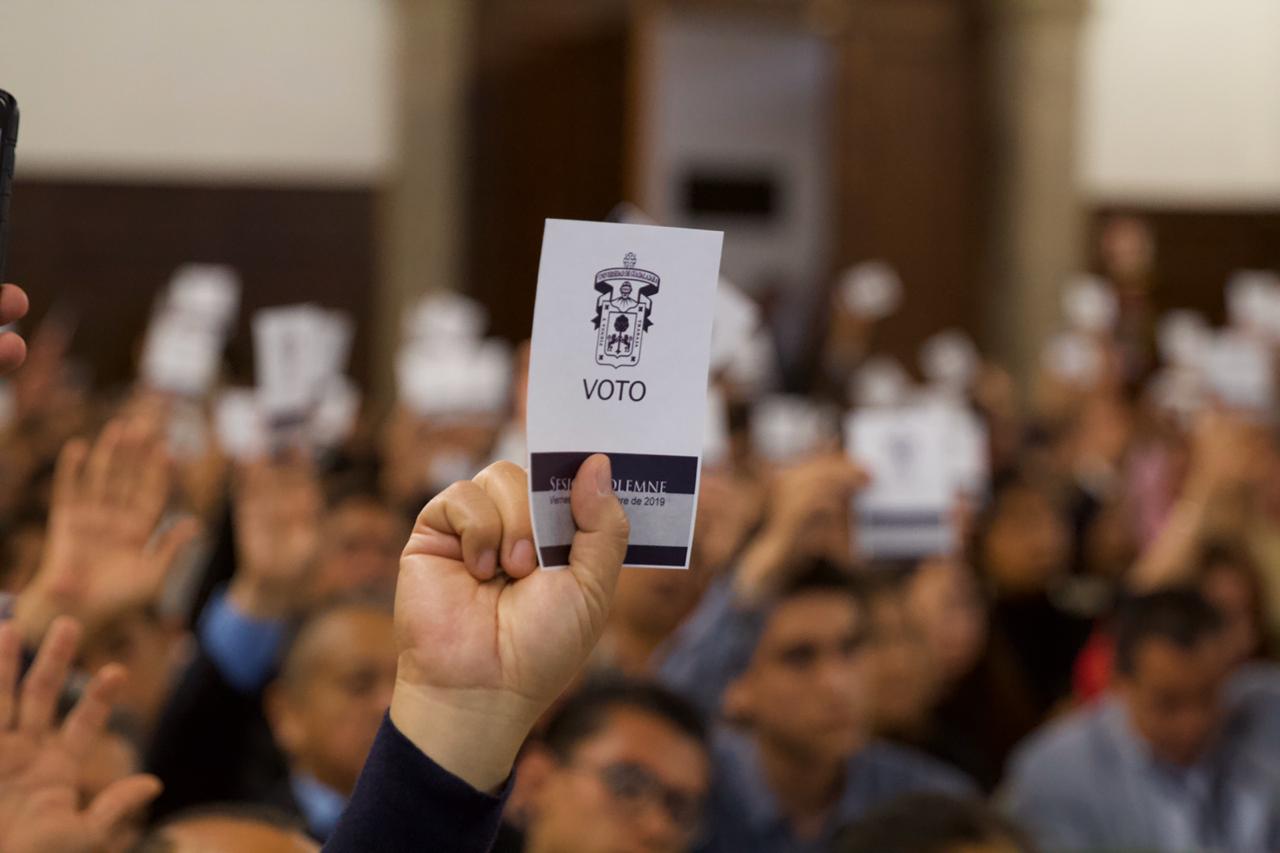 manos con voto