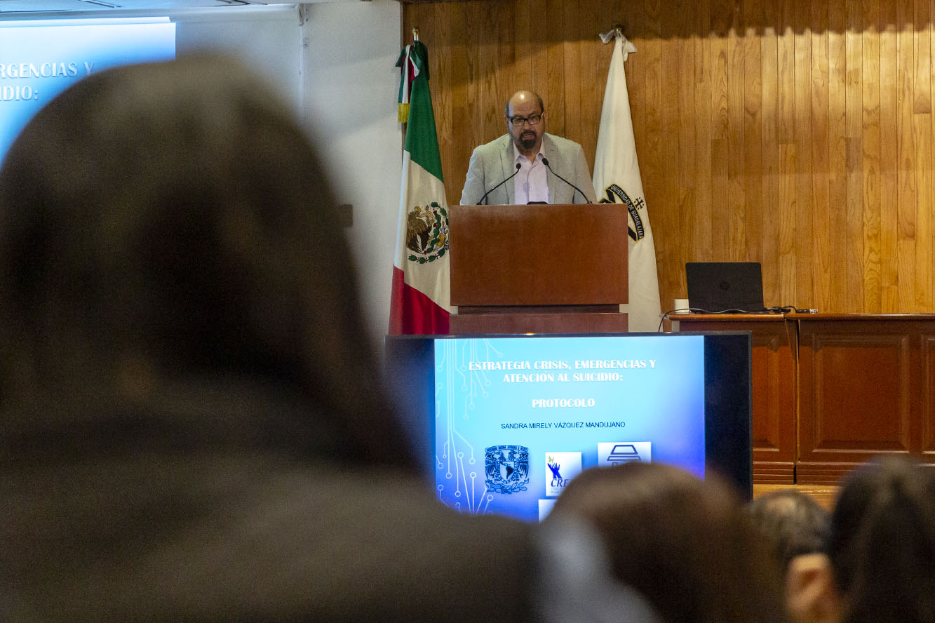 Asistentes a evento en auditorio