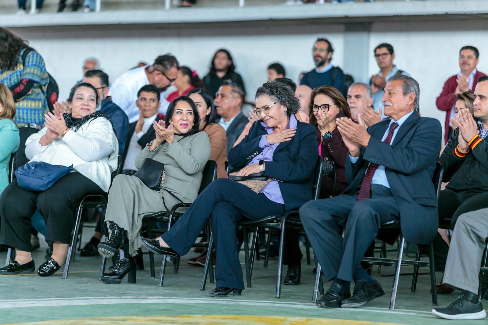 Asistentes al evento sentados