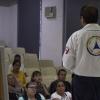 Expositor en auditorio frente a asistentes