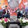 Autoridades del evento frente a asistentes