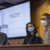 Autoridades del evento frente a asistentes en auditorio