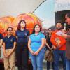 Integrantes de la escudería Tlaqueracing junto al maestro César Barba en uso de la voz