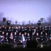 Alumnos en escenario de auditorio