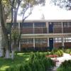Edificio y jardín de la preparatoria