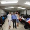 Directora de la Preparatoria de Puerto Vallarta, licenciada Susana Ambriz, y docentes con alumnos en el aula de cómputo del plantel