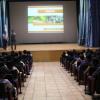 Expositor en auditorio frente a asistentes