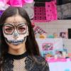 Alumna pintada de catrina