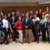 Grupo de participantes junto a director del plantel
