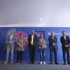 Autoridades del evento en presidium frente a integrantes del c g u en auditorio