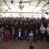 Autoridades del evento junto a graduados