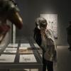 Visitantes a exposición en el musa