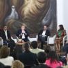 Autoridades del evento en presidium frente a asistentes