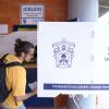 Alumno en urna