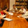 Autoridades del evento en reunión